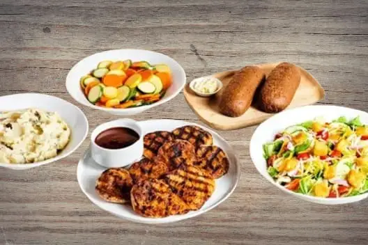 "Outback Steakhouse Kids Eat Free special offer with purchase of adult entrée, limited time family dining deal"