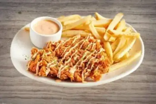 "Outback Steakhouse Lunch Size Bloomin' Fried Chicken topped with spicy bloom sauce and crispy fried coating"