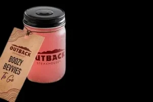 "Outback Steakhouse Happy Hour drink menu featuring discounted cocktails, draft beers, house wines, and margaritas"