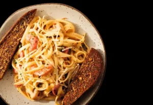 Outback Steakhouse pasta with grilled chicken and creamy sauce


